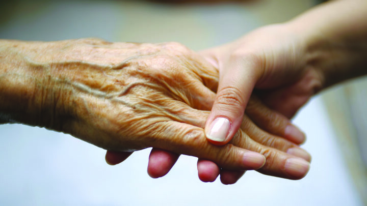 Care of the Elderly conference image. Hand holding